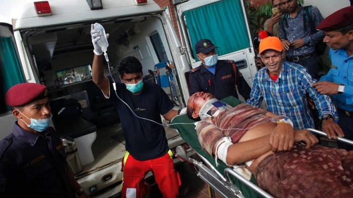 Overcrowded bus slips off mountain road in Nepal, killing 14 